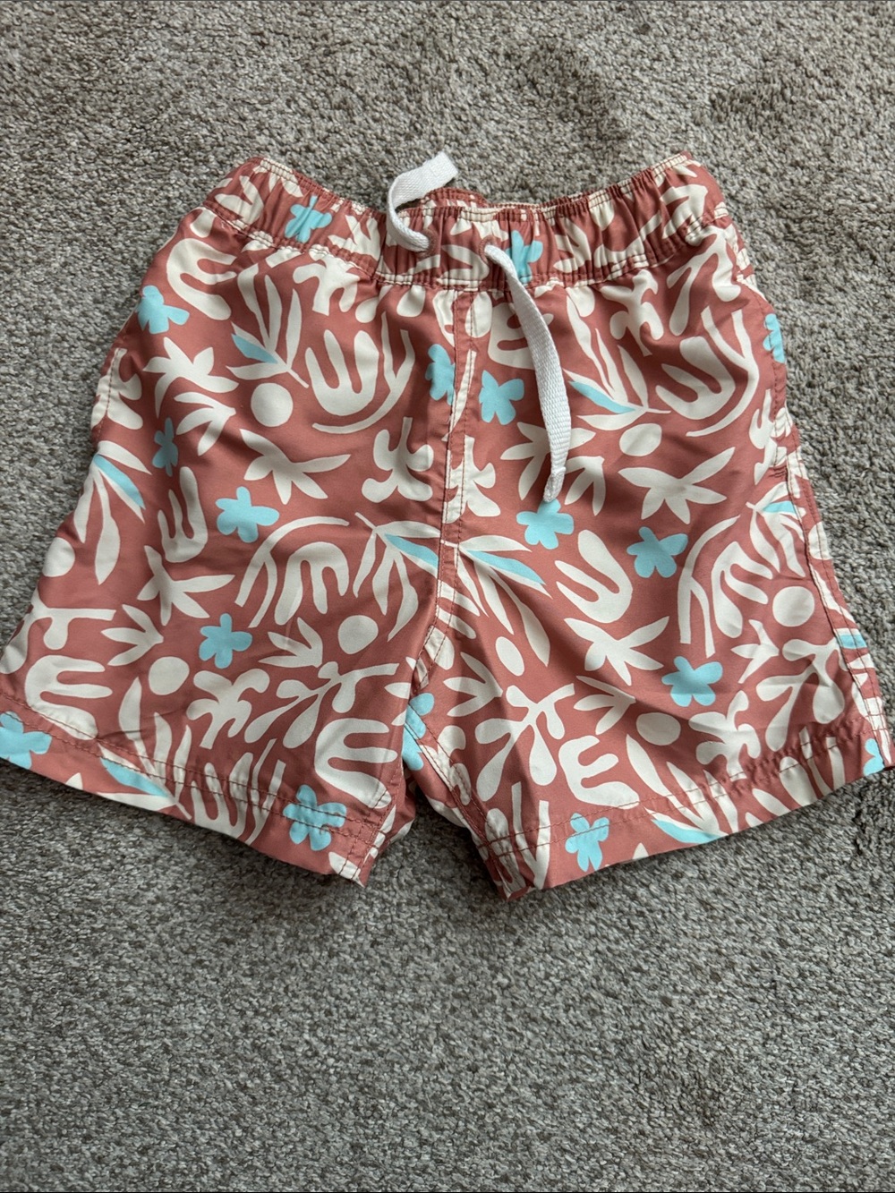 Hanna Andersson Coral Floral Swim Shorts with Light Blue Accents